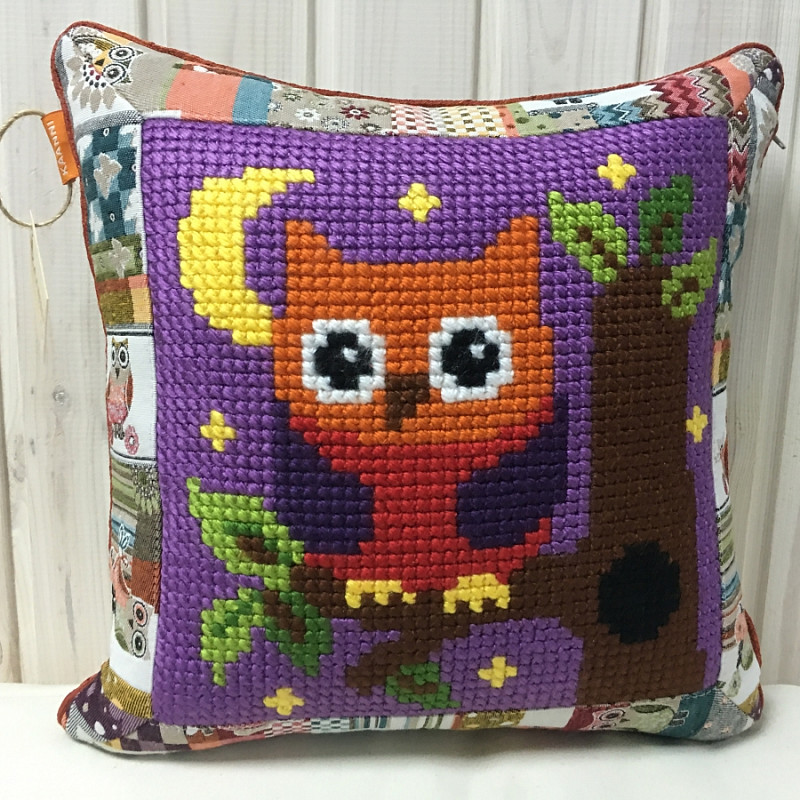 Совенок на ветке